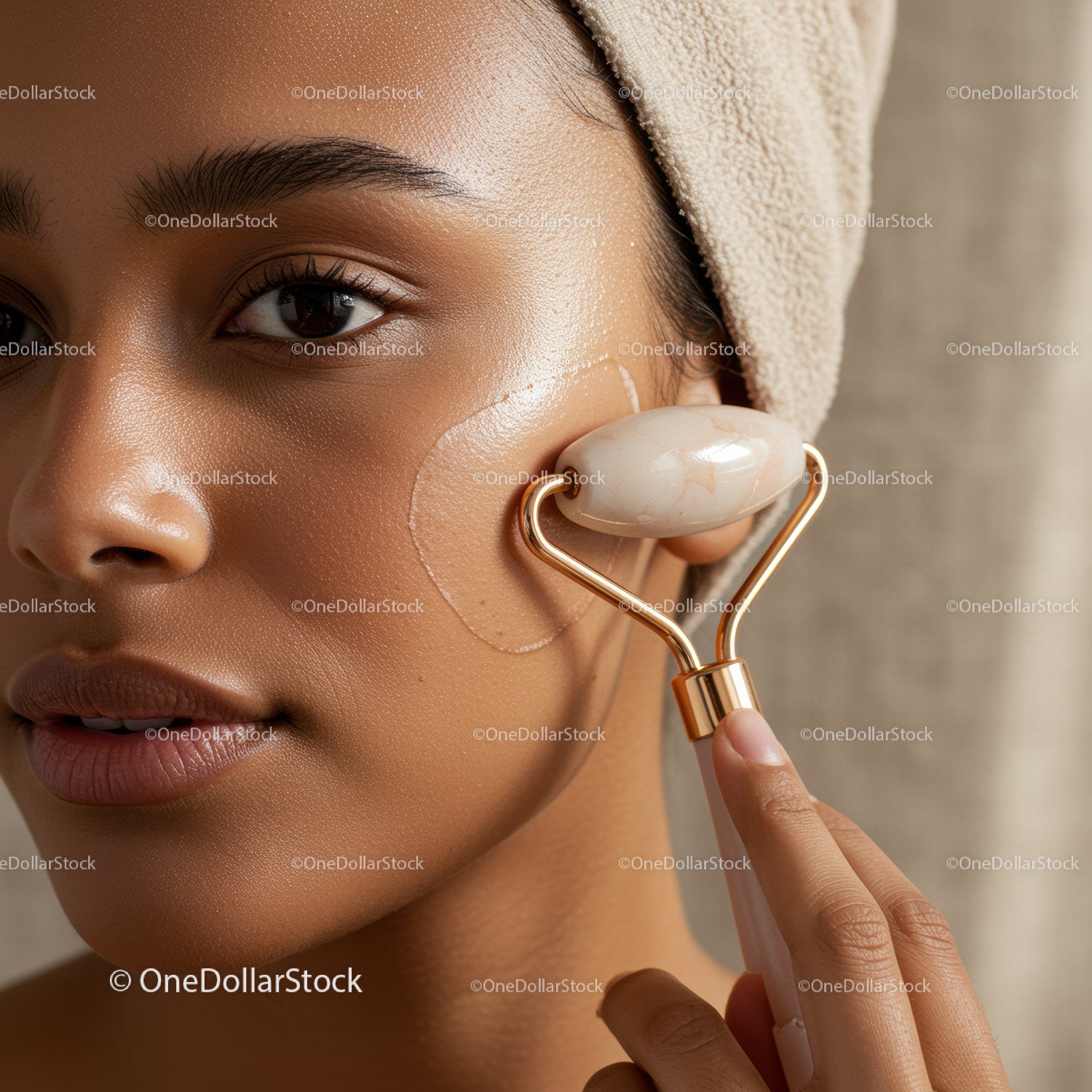 Close-Up of a Woman Using Jade Roller for Skin Rejuvenation