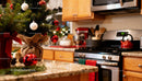 Festive Christmas kitchen with decorated miniature tree