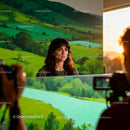 Woman posing for photoshoot against nature backdrop