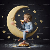Toddler in Pajamas Sitting on Moon Eating Cake
