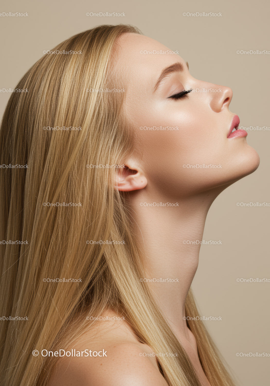 Profile of serene young woman with flawless skin