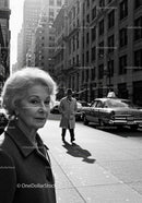 Black and White City Street Scene with Elderly Woman and Vintage Car