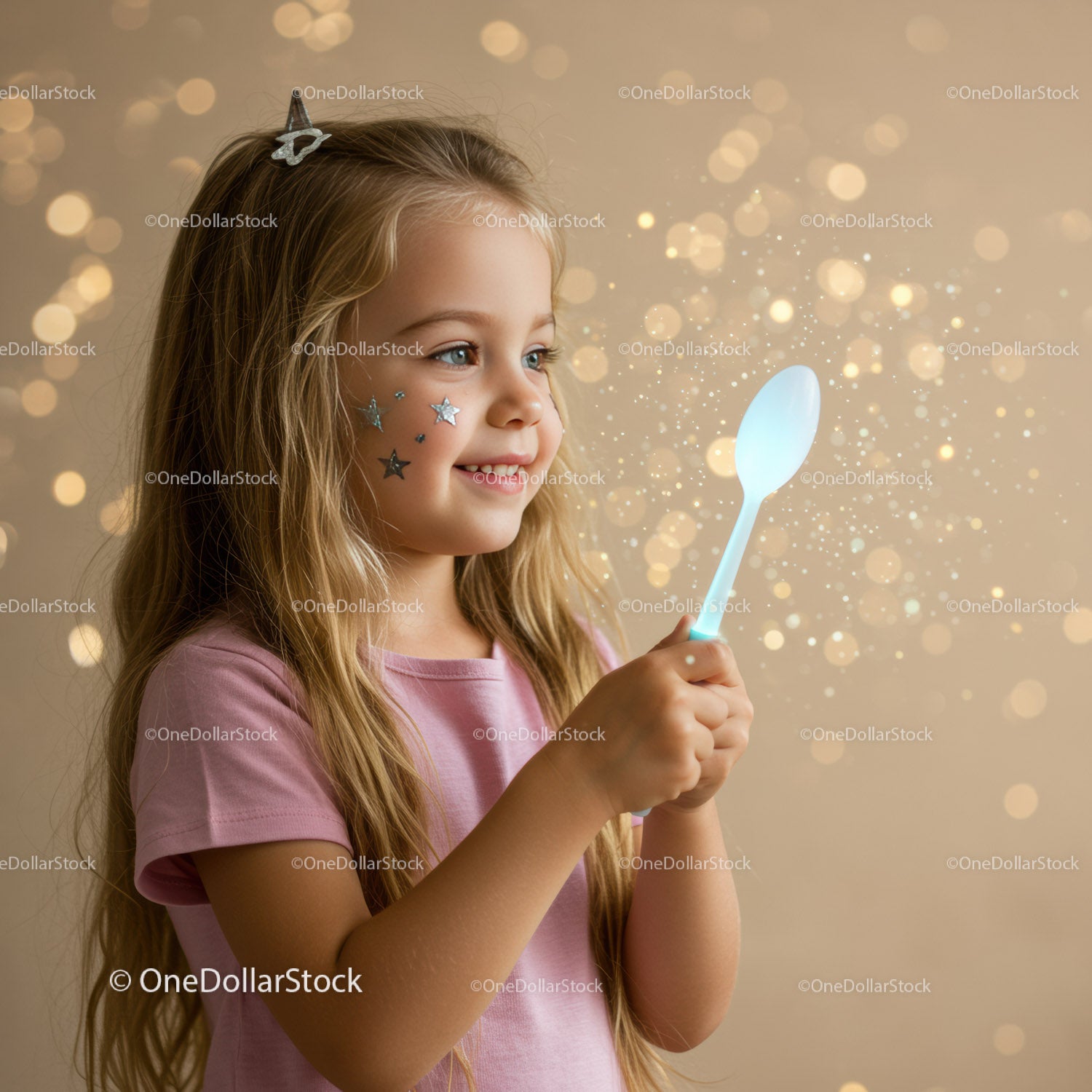 Little girl holding glowing spoon with magical sparkle