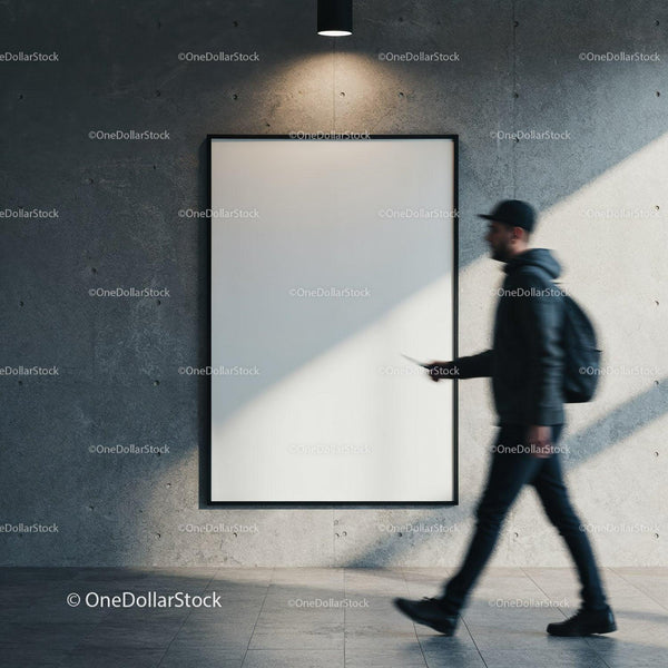 Man Walking Past Blank Poster in Industrial Interior JPG Mockup Image