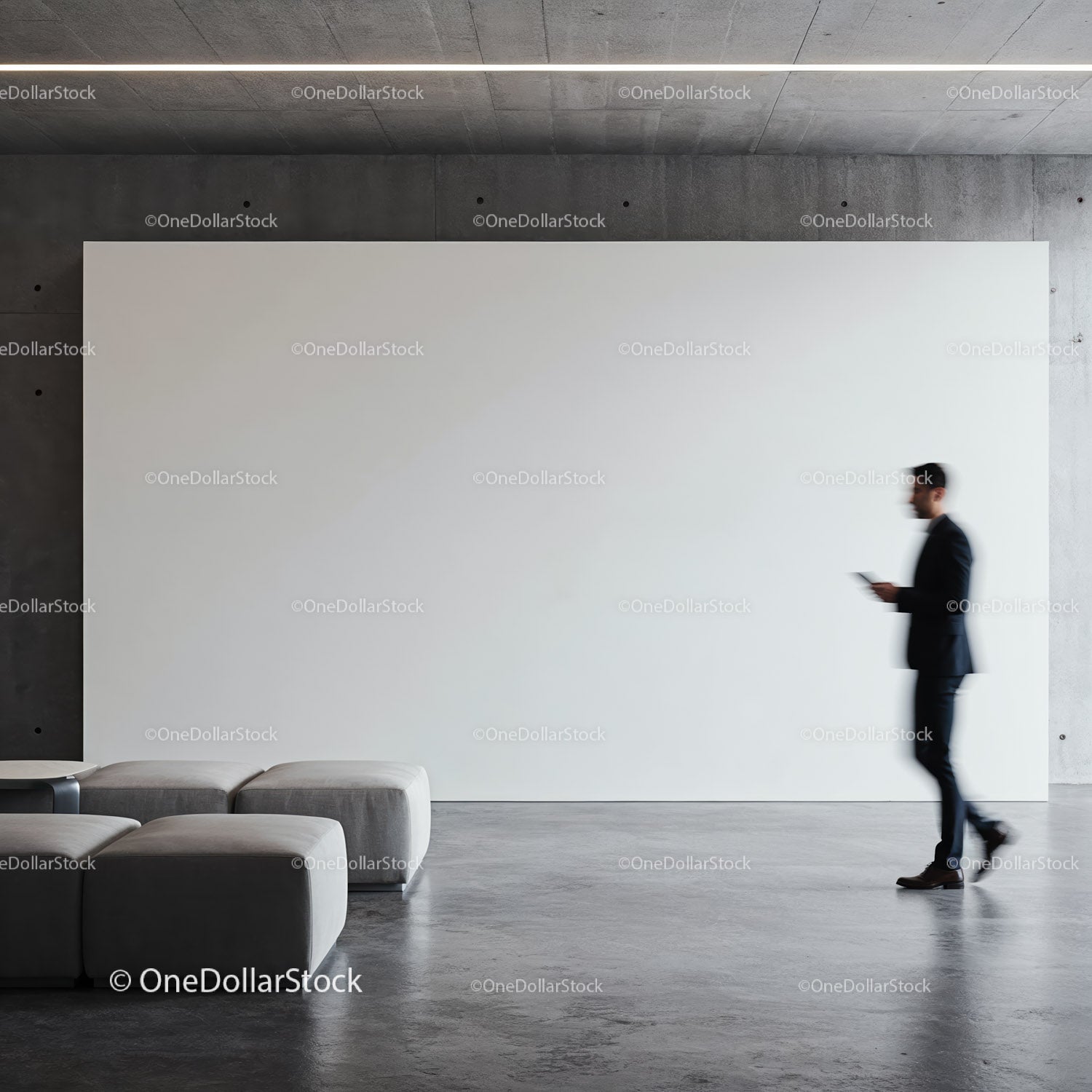Businessman walking by blank modern gallery wall