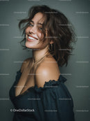 Joyful Woman with Wavy Hair Wearing Off-Shoulder Top