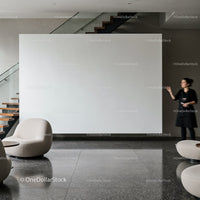 Modern lobby with minimalistic seating and staircase