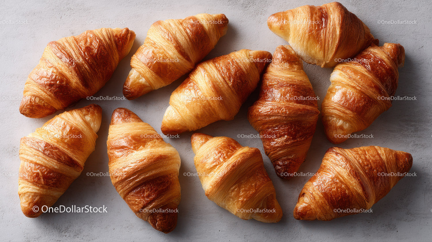 Fresh Golden Croissants on Gray Background for Breakfast and Bakery