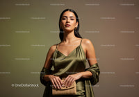 Elegant Woman in Satin Dress with Accessories in Studio Lighting