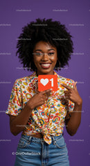 Vibrant Young Woman Holding Like Icon in Bright Casual Outfit