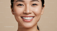 Close-up of happy woman with radiant smile