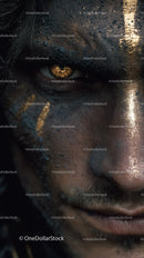Close-up of An African Tribal Face with Gold Metallic Body Art