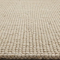 Beige Woven Rug with Textured Pattern for Home Decor and Interior Design