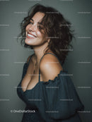 Elegant Woman with Short Wavy Hair Smiling in Studio Portrait