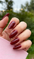 Elegant deep red manicure on natural nails