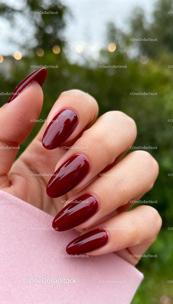 Elegant deep red manicure on natural nails