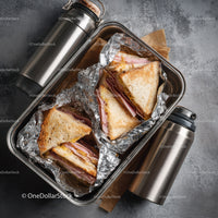 Ham and Cheese Toasted Sandwiches in Aluminum Foil with Metal Bottles