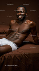 Smiling fit man relaxing on brown bedding in white briefs