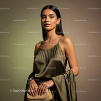 Elegant Woman in Silk Dress Standing Against Gradient Background