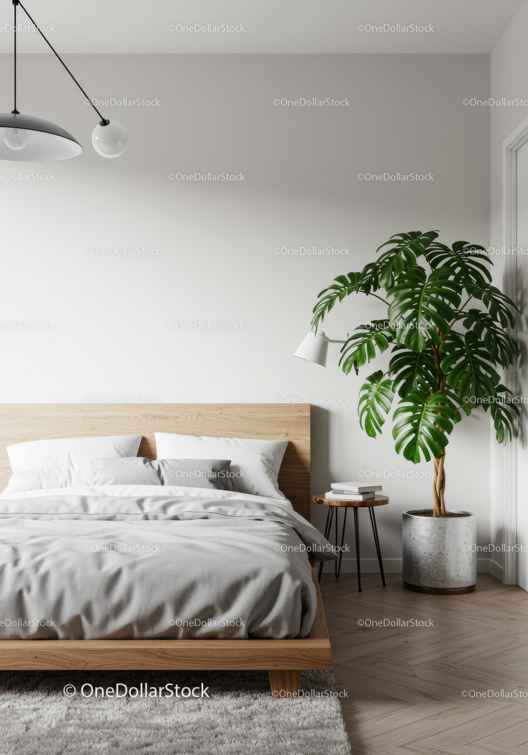 Nowoczesne wnętrze sypialni z rośliną Monstera i minimalistycznym wystrojem