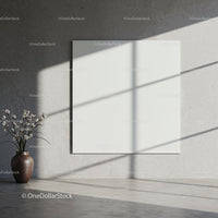 Minimalist room with ceramic vase and blank canvas