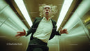Distraught Woman in Business Attire in Elevator Scene
