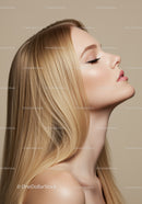 Profile of serene woman with flowing blonde hair