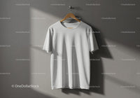 Minimalist White T-Shirt Hanging on Wooden Hanger