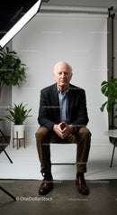 Confident Senior Man in Professional Portrait Setting