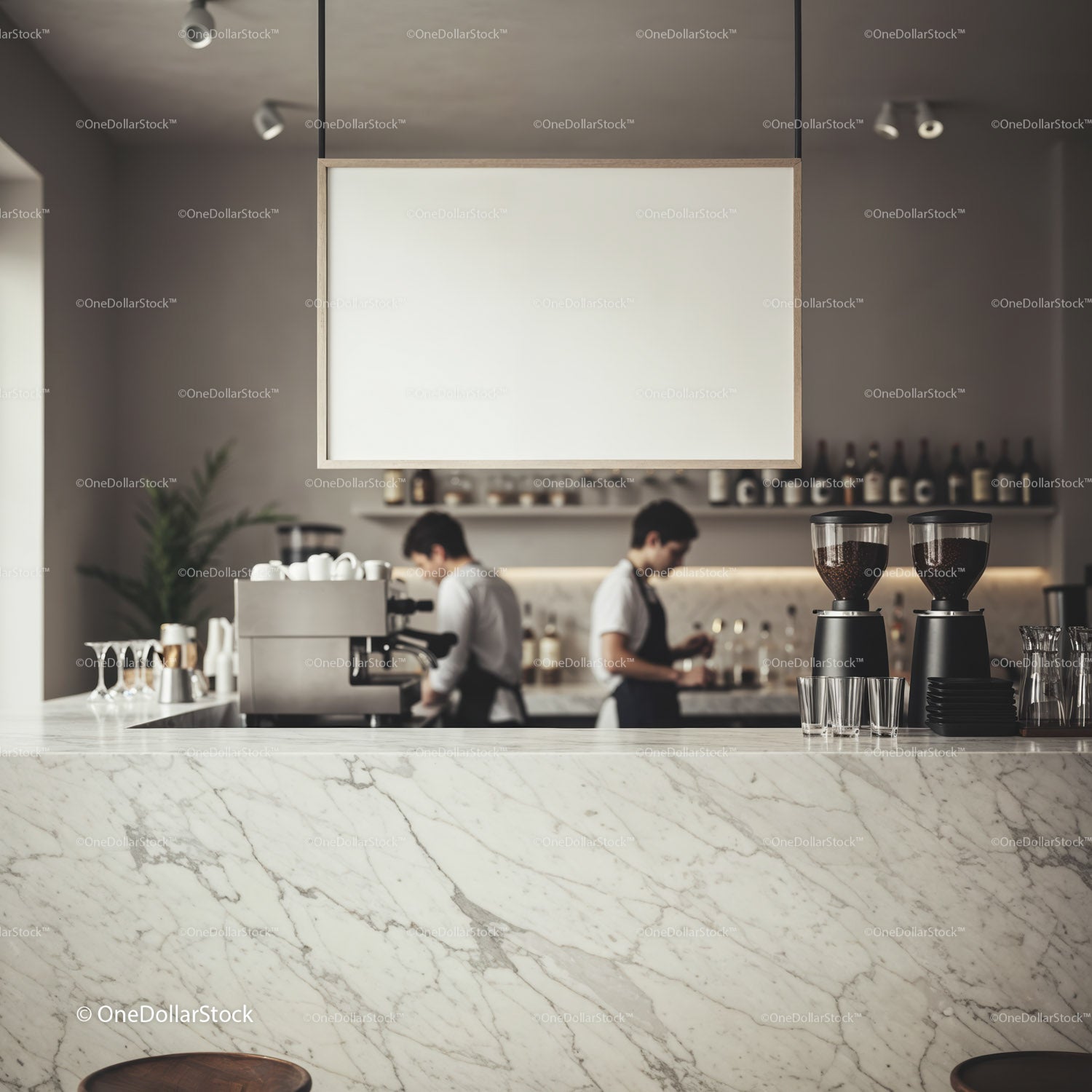 Baristas preparing coffee behind marble counter in cafe