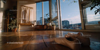 Bright ballet shoes on wooden floor with city view in dance studio