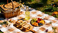 Fresh summer picnic with sandwiches and fruit plate