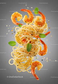 Fresh shrimp pasta with sesame seeds and mint leaves