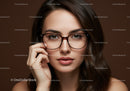 Close-up of a Stylish Woman Wearing Glasses with Brown Hair