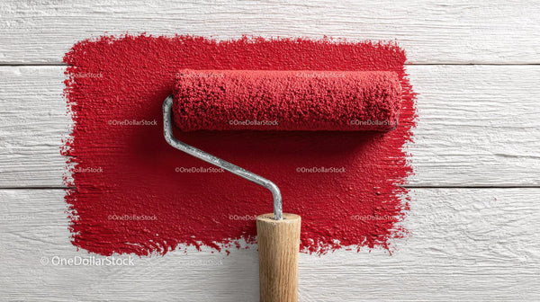 Red Paint Application on White Wooden Surface for Interior Renovation