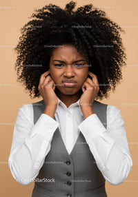 Frustrated Woman Covering Ears with Annoyed Expression