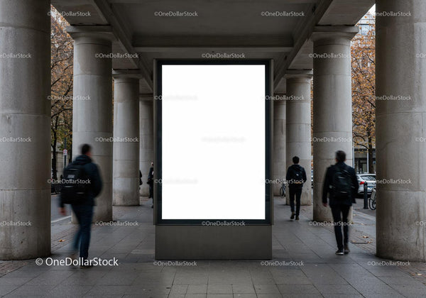 Empty vertical city billboard between large stone columns JPG Mockup Image