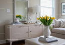 Elegant Interior with Yellow Tulips and Beige Modern Furniture