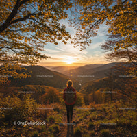 Autumn Mountain Sunset with Hiker on Forest Trail