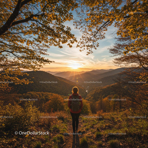 Autumn Mountain Sunset with Hiker on Forest Trail