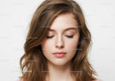 Close Up of Young Woman with Natural Makeup and Soft Expression