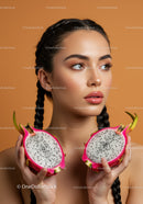 Beautiful Woman with Braided Hair Holding Fresh Dragon Fruits