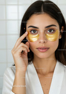 Young Woman Relaxing with Gold Under Eye Patches for Skin Rejuvenation