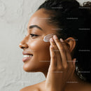 Young Woman Applying Facial Skincare Cream for Healthy Radiant Skin