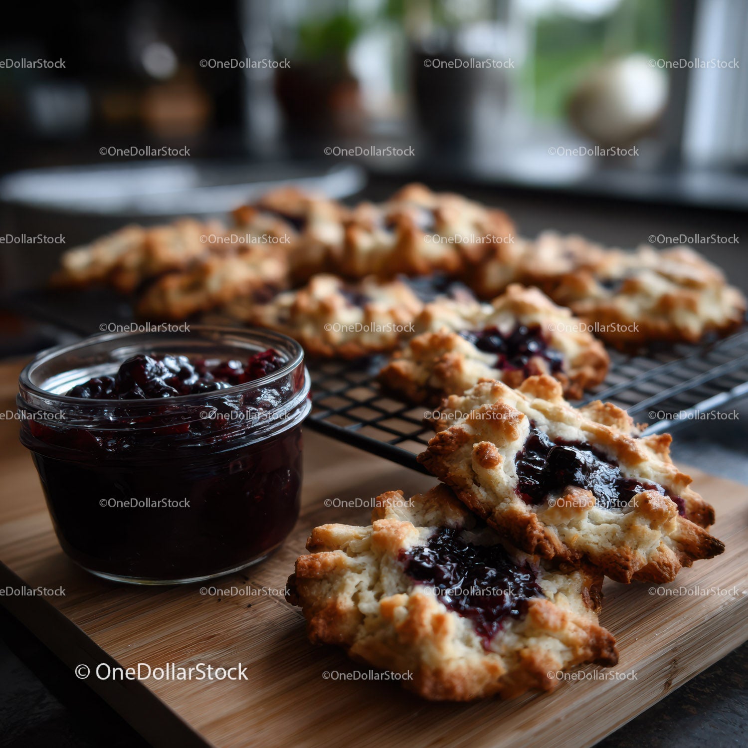 Homemade Berry Jam and Fruit Cookies on Wooden Board