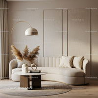 Cozy beige living room with modern curved sofa and decor