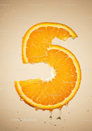 Fresh orange slice shaped as number five with drops