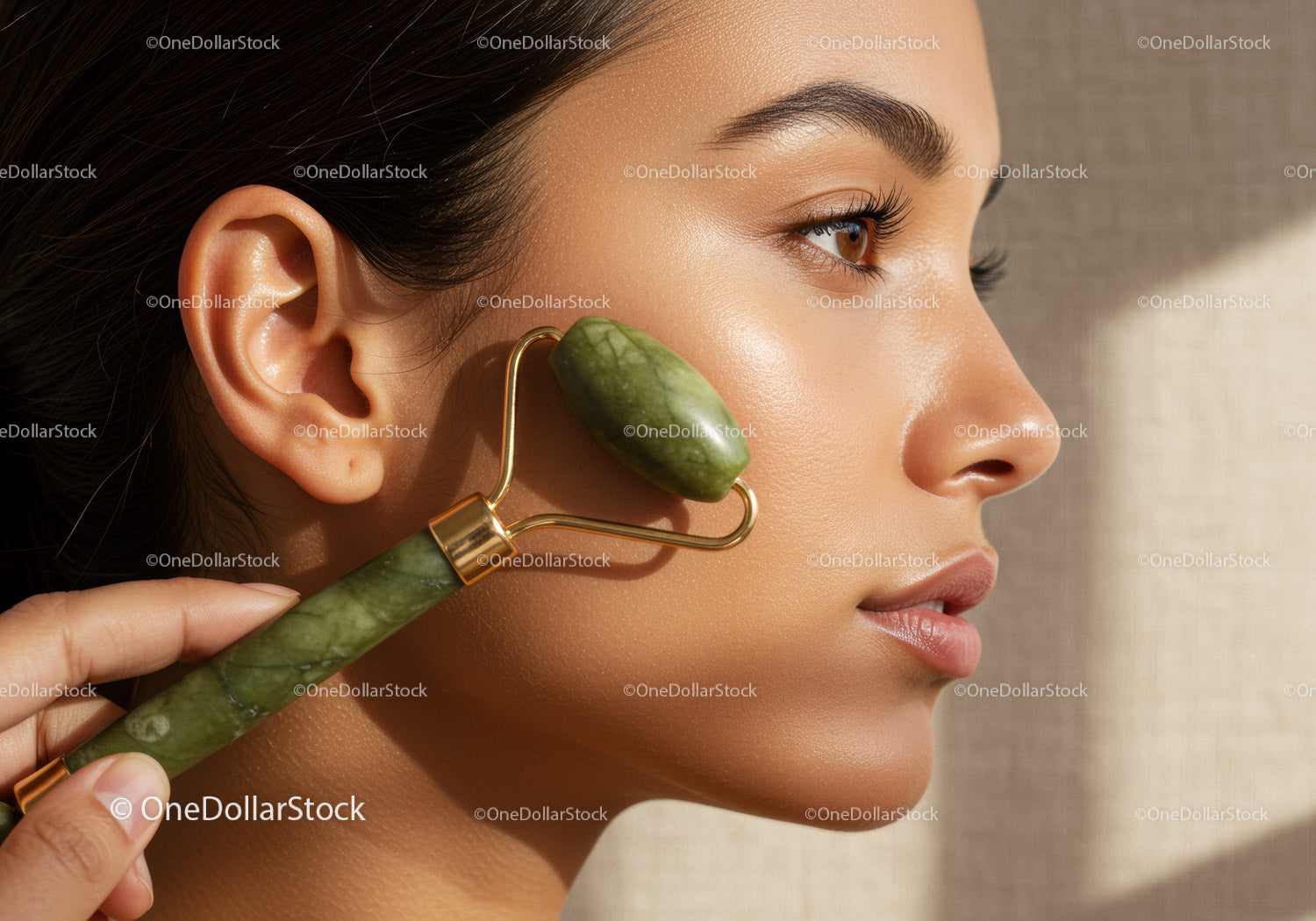 Close-Up of Woman Using Jade Roller for Facial Skincare