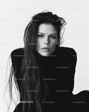 Black and White Portrait of a Confident Female Model with Long Hair