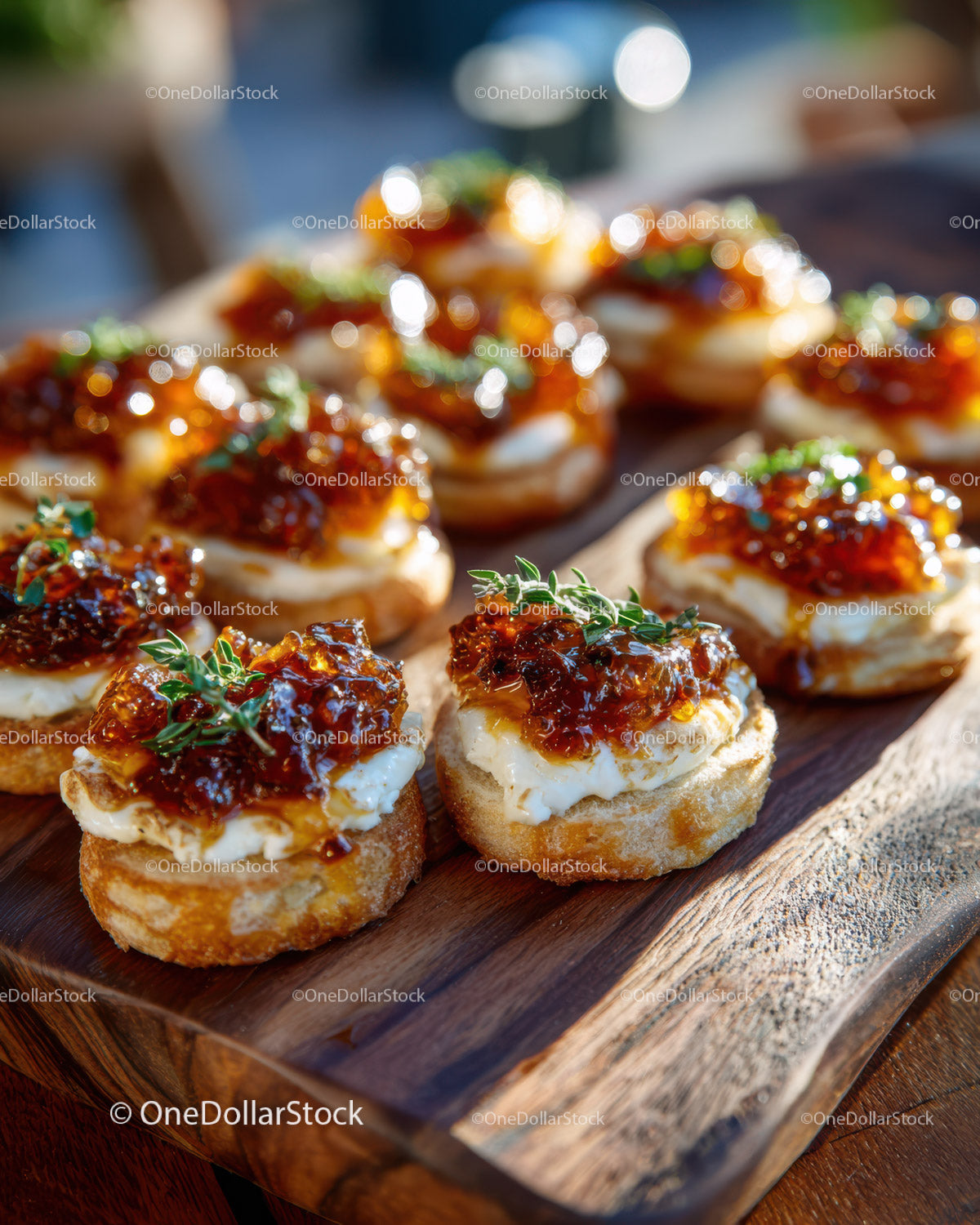 Gourmet Canapés with Cheese and Glazed Meat on Wooden Board